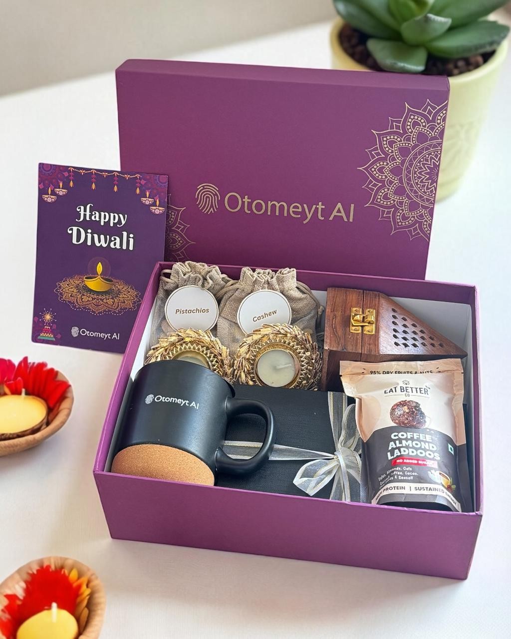 Purple corporate hamper with a mug, jars and packaged gifts